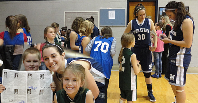 Women's Basketball Hosting Take A Kid to Game & Book Drive on January 11th
