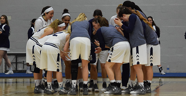 The women's basketball team prepares for tip-off versus Centenary College in the 2017 ECAC Division III Tournament First Round.