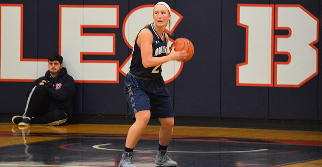 Trista Cunningham '18 looks for an outlet pass in a game at DeSales University.