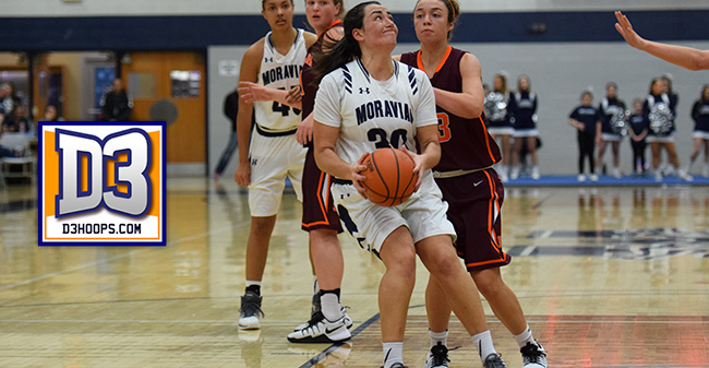 Camille McPherson '17 drives to the hoop versus Susquehanna University in January 2017.