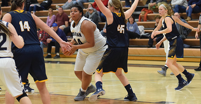 Ciara Stewart '18 drives towards the basket versus The College of New Jersey.
