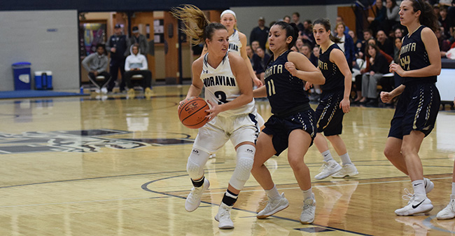 Maddie Capuano '20 drives to the basket in a game versus Juniata College earlier this season.