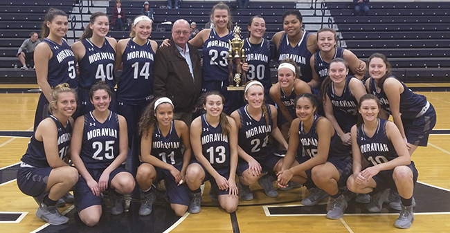 Moravian posing with the team championship trophy after winning the 2017 Rinso Marquette Tournament at Lebanon Valley College.