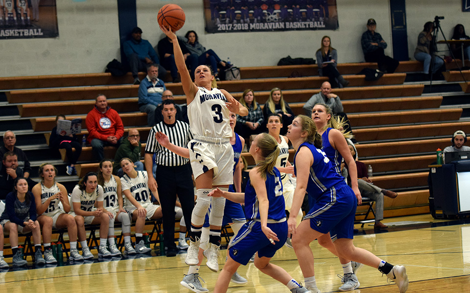Junior Maddie Capuano drives to the basket for two of her career-high 40 points versus Elizabethtown College in Johnston Hall.