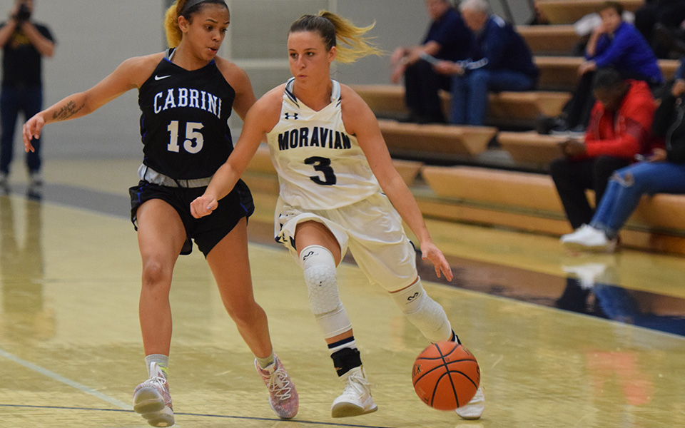 Maddie Capuano drives to the basket versus Cabrini University in the 16th Steel Club Classic.