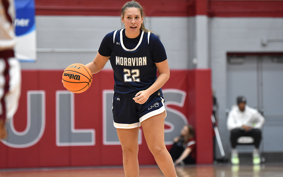 Sophomore guard Juliana Vassallo looks to set up the offense in the second half at Muhlenberg College to open the 2023-24 season. Photo by Christine Fox