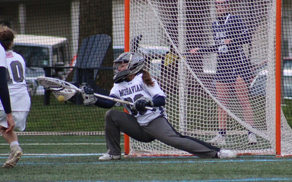 Sophomore goalie Courtney Heist makes a save on an eight-meter shot with less than a minute remaining to preserve a one-goal victory over FDU-Florham on John Makuvek Field.