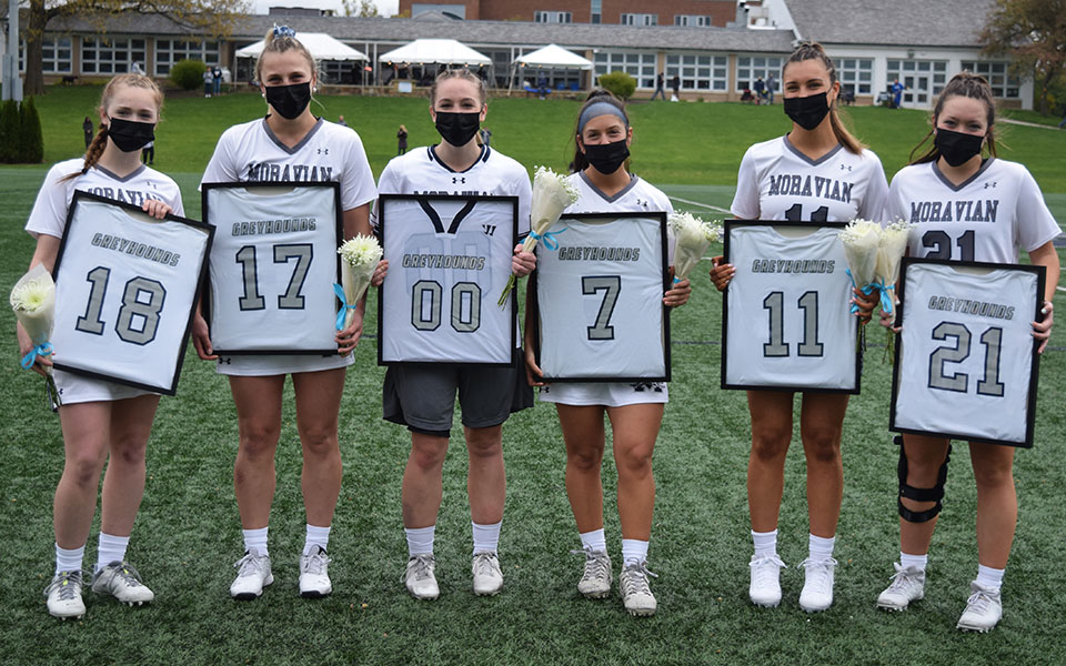 Seniors Danielle Sullivan, Meaghan McMullan, Courtney Heist, Breanna Federico, Olivia Clearie and Maecy Chlebowski with their frame jerseys before the Greyhounds played No. 20 Christopher Newport University on John Makuvek Field.