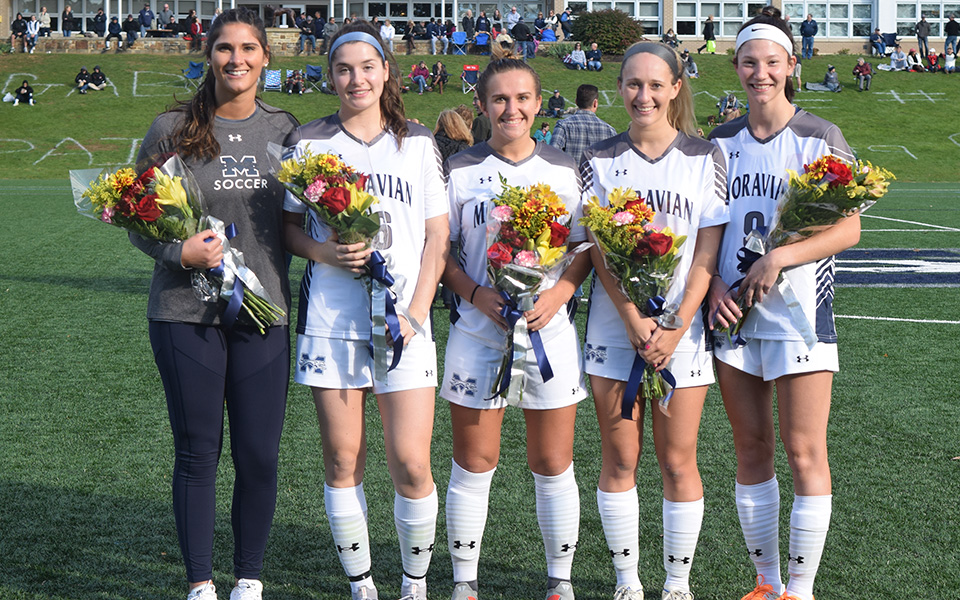 Moravian honored seniors midfielder Shae Duka, defender Paige Kovacs, midfielder Aimee Manley, forward Gabby Stelzmiller and Gabby Nasta, who has spent the last two seasons working as an academic mentor with the freshmen class after playing two season for the Hounds prior to the start of the match versus Catholic.
