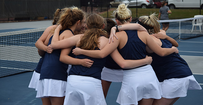 The Greyhounds huddle up before the start of their final fall match versus NCAA Division I Lafayette College.