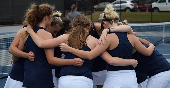 The Greyhounds huddle before their final match of the fall versus Lafayette College.
