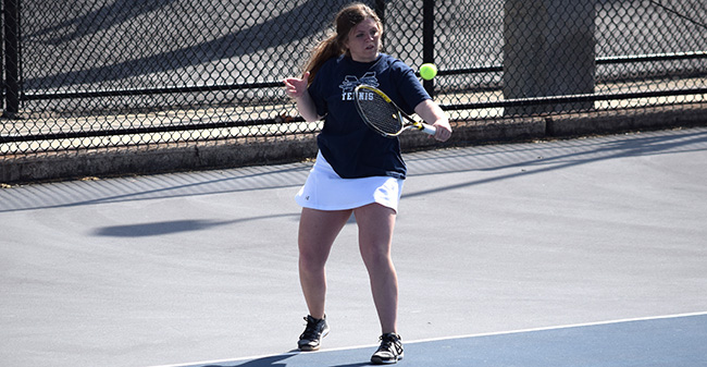 Kristen Cassidy '21 hits a backhand in doubles action versus Drew University at Hoffman Courts.