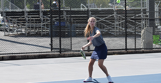 Brooke Adams '21 warms up for a match versus Delaware Valley University.