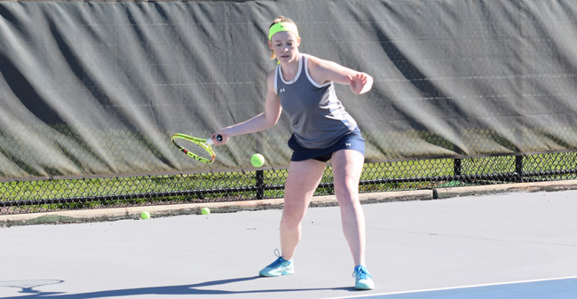 Skyler Oliwa '18 competes against Goucher College in April 2017.