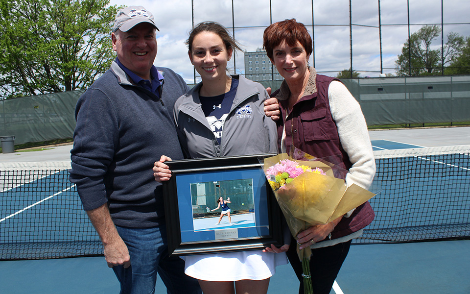 Senior Kate Rennar with her parents on Senior Day at Hoffman Courts before a match versus Drew University.