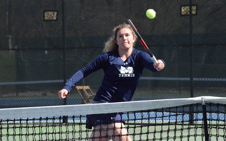 Sophomore Emma Angle returns a shot versus Middlebury (Vt.) College in the second round of the 2019 NCAA Division III Tournament.
