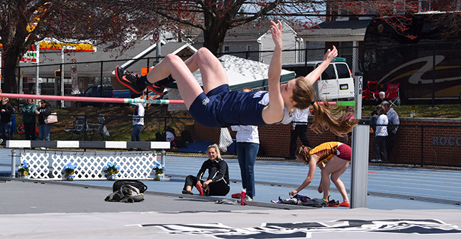 Casie Cronk '18 clears the high jump bar in the Greyhound Invitational at Timothy Breidegam Track.