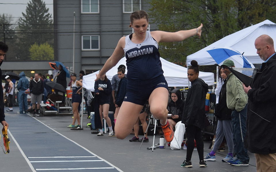 Sophomore Jenevieve Eberly competes in the long jump during the Greyhound Invitational at Timothy Breidegam Track.