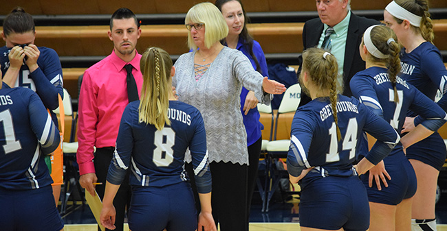 Head Coach Shelley Bauder talks with the Greyhounds during a break in the action versus Penn St.-Berks.