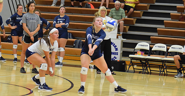 Corinne Frick '21 digs up a ball against Wilkes University.
