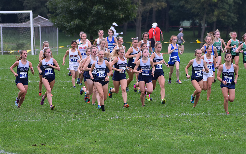 The Greyhounds take off from the starting line in the Moravian/Cedar Crest Invitational at Bicentennial Park.