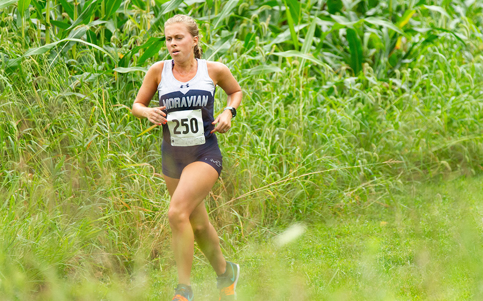 Junior Katie Mayer runs during the Bulldog Invitational at DeSales University to begin the season. Photo courtesy of Patrick Jacoby, DeSales Athletic Communications