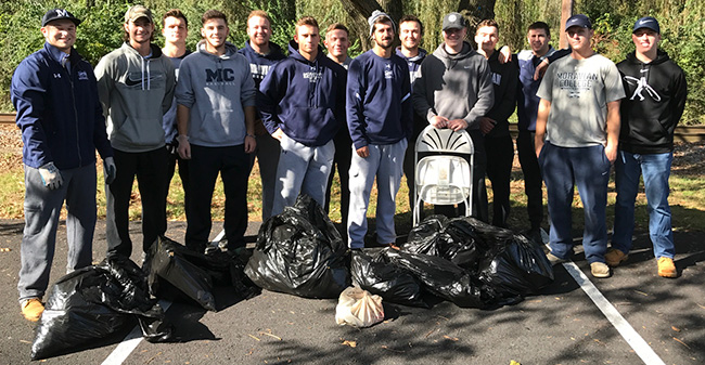 Members of the Moravian College baseball team with the trash collected from cleaning up around Monocacy Creek.