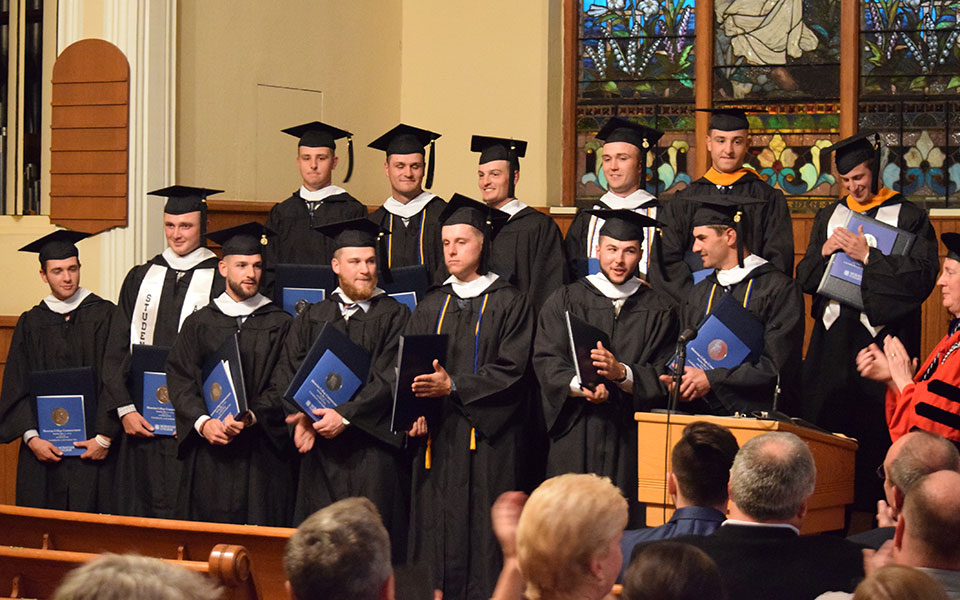 The Class of 2019 baseball student-athletes during the special graduation ceremony in Borhek Chapel after missing the Moravian College Commencement ceremony due to competition.