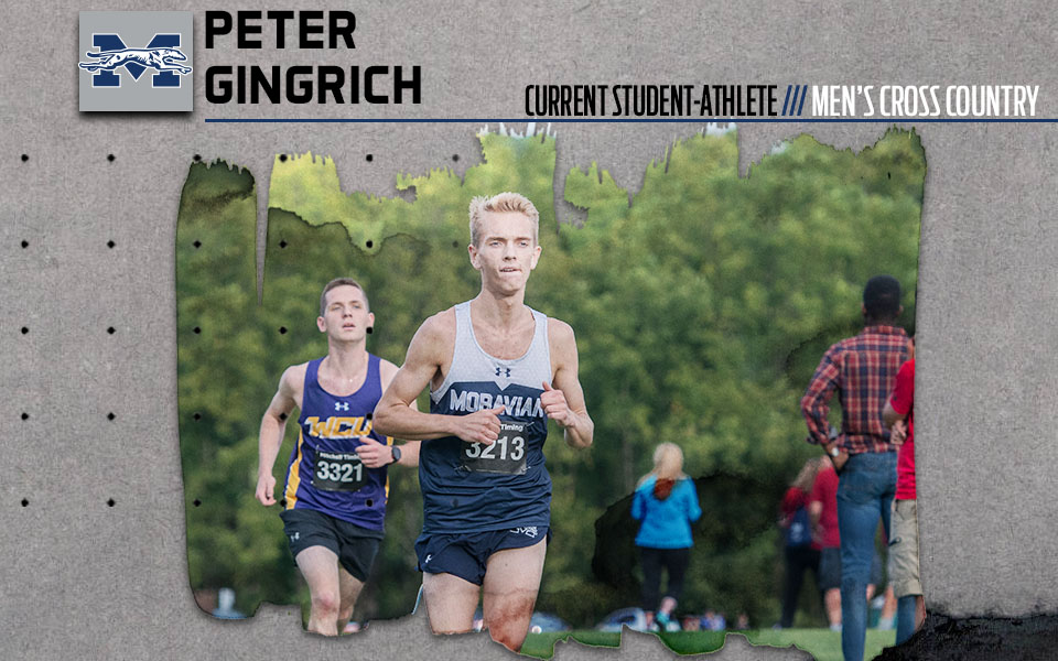 Current student-athlete Peter Gingrich running in a cross country race.
