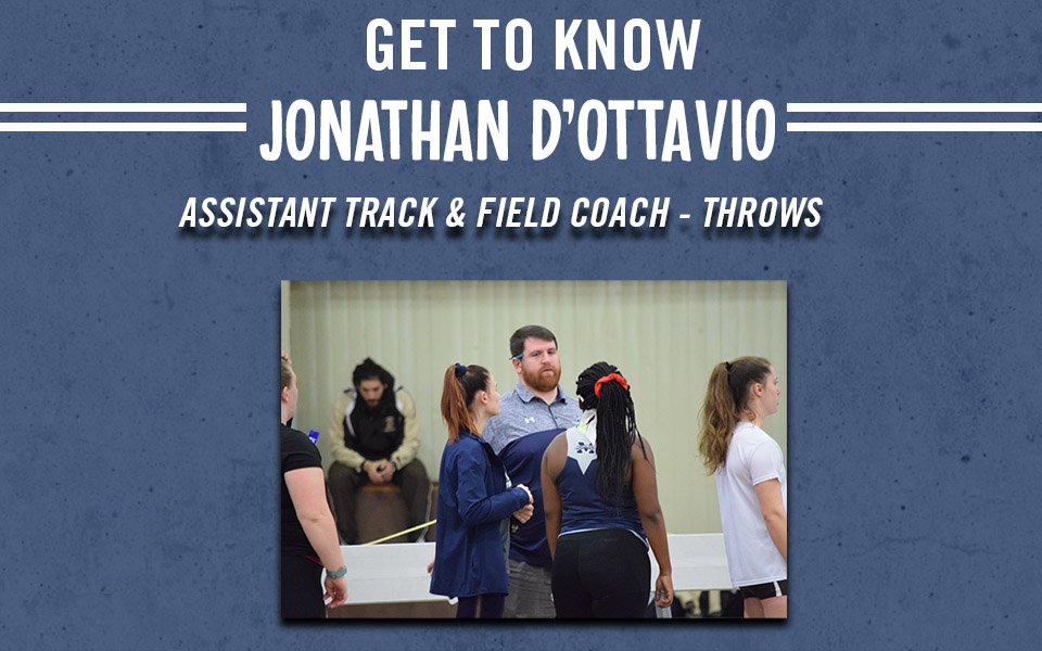 jonathan d'ottavio talking with his throwers at a meet in rauch fieldhouse at lehigh university.