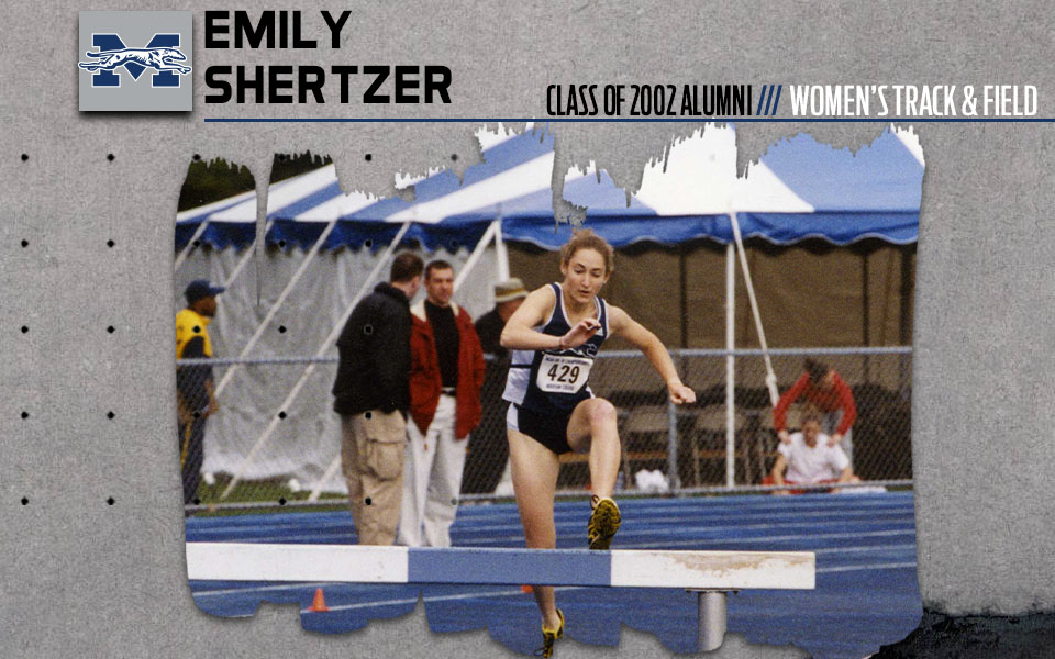 Get to Know Emily Shertzer, Class of 2002, with a picture of Emily competing in the steeplechase at Timothy Breidegam Track.