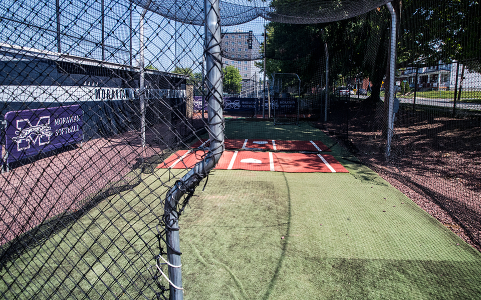 Softball batting cage. Photo by Cosmic Fox Media / Matthew Levine '11
