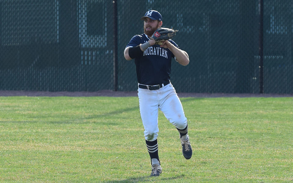 Sophomore Thomas Philipps throws a ball in from right field versus Susquehanna University at Gillespie Field.