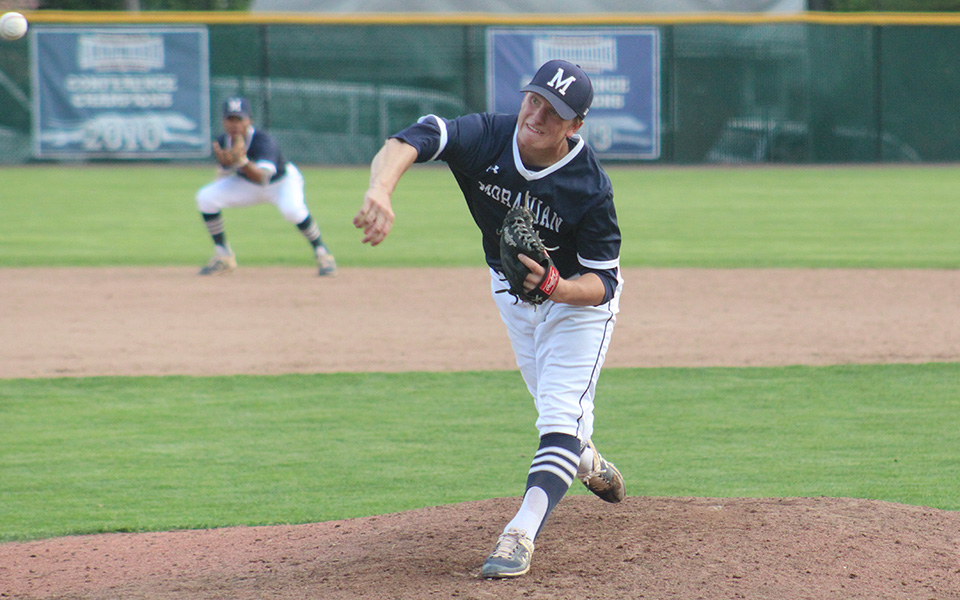 Sophomore Scott Poulson delivers a pitch during a game versus Messiah College at Gillepsie Field during the 2019 season.