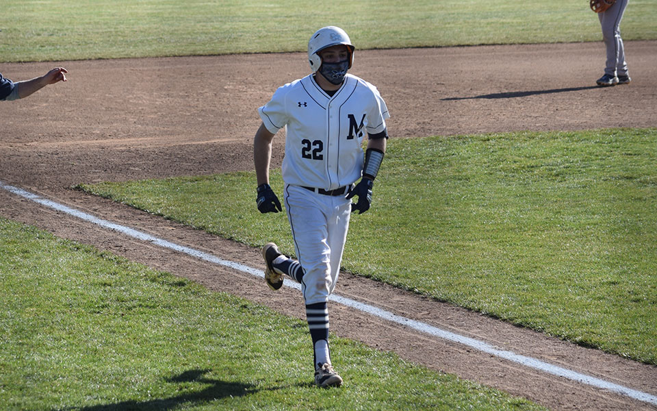 Brett Stewart '24 comes down the third base line after hitting his first collegiate home run versus Juniata College at Gillespie Field.