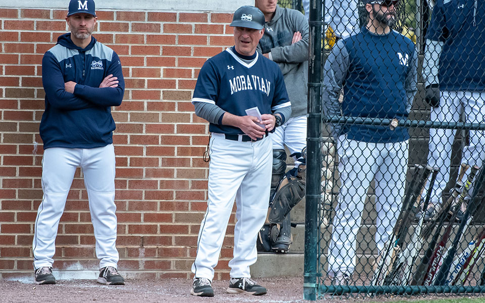 Head Coach Paul Engelhardt in the dugout at Gillespie Field in a game versus Rutgers-Camden during the 2019 season.