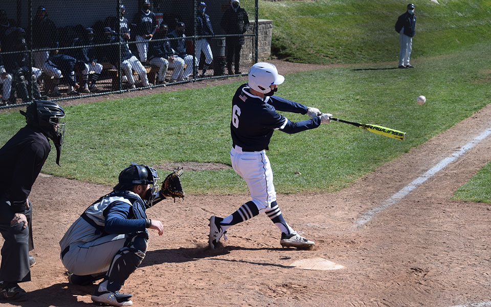 David Olsakowski '24 connects on a three-run homer in his first collegiate at-bat at Gillespie Field versus Neumann University.