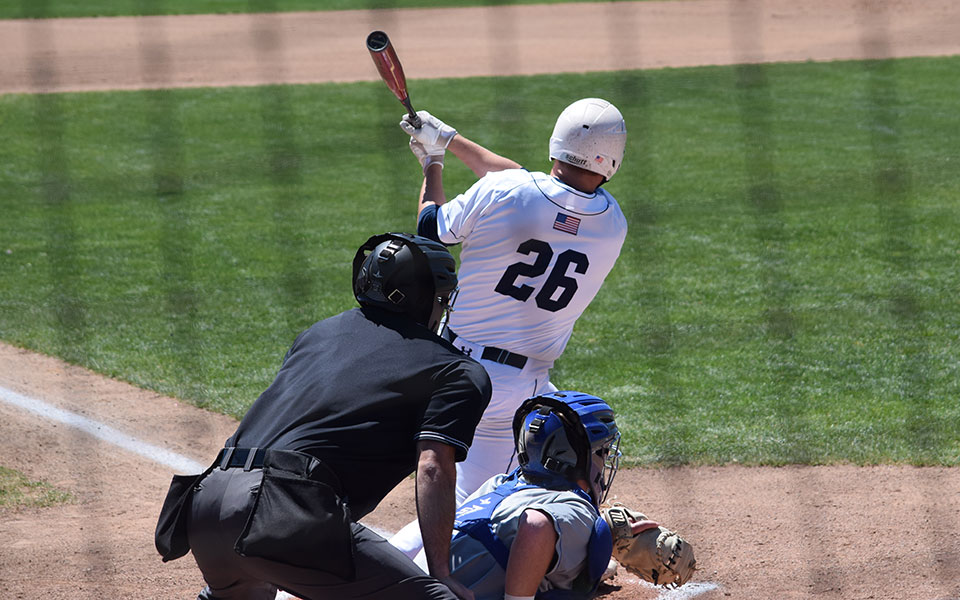 Derek Holmes '23 connects for a hit versus Elizabethtown College at Gillespie Field on May 1, 2021.