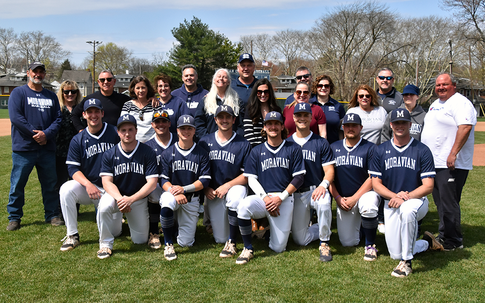 The 2022 Moravian University baseball seniors and their parents on Senior Day at Gillespie Field. Photo by Marissa Werner '23