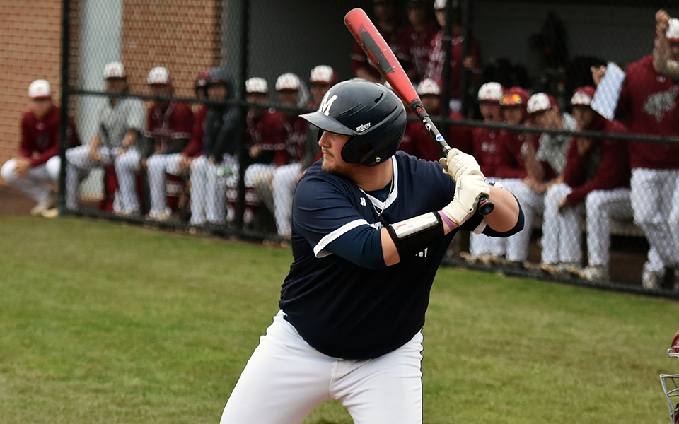 Graduate student Brett Moyer awaits a pitch while in the batter's box at Gillespie Field versus Muhlenberg College.