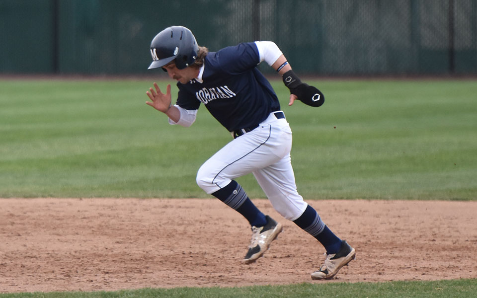 Senior outfielder Elias Engelhardt heads towards third base in the sixth inning of the Greyhounds' win over rival Muhlenberg College at Gillespie Field. Photo by Ava Edwards '22