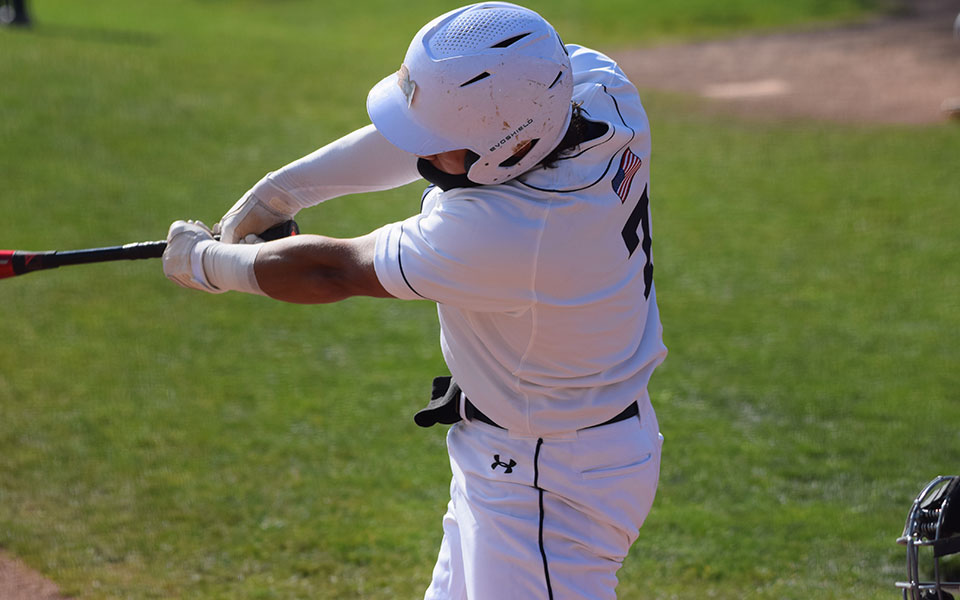 Infielder Chris Pow connects on a pitch during a Landmark Conference Tournament game at Gillespie Field in May 2021. Photo by Mairi West '23