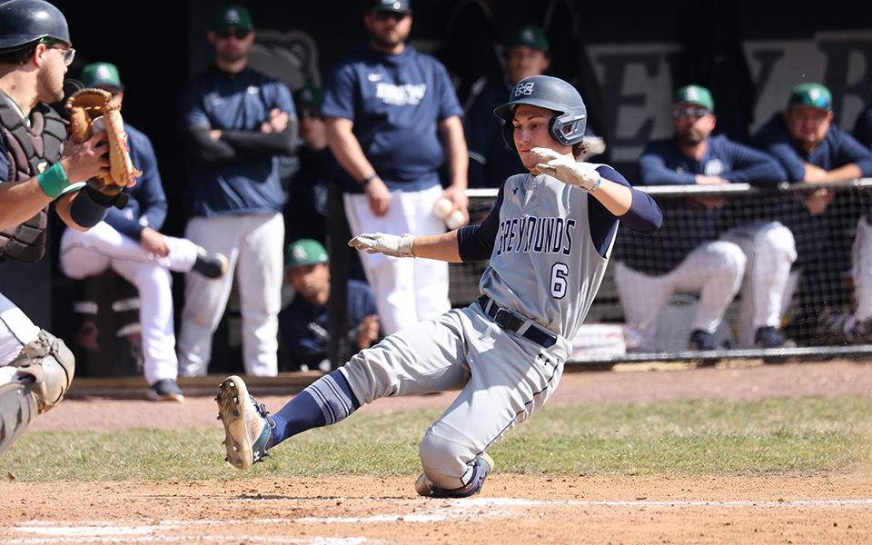 Junior left fielder David Olsakowski slides into home during the opening game of a Landmark Conference doubleheader at Drew University. Photo by Bob Koch / Entropy Sports Photography
