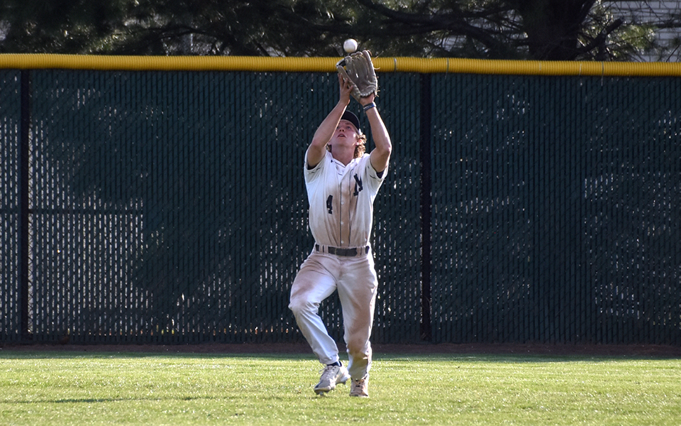 Senior center fielder Matt Madigan catches a fly ball versus Neumann University at Gillespie Field. Photo by Grace Nelson '26