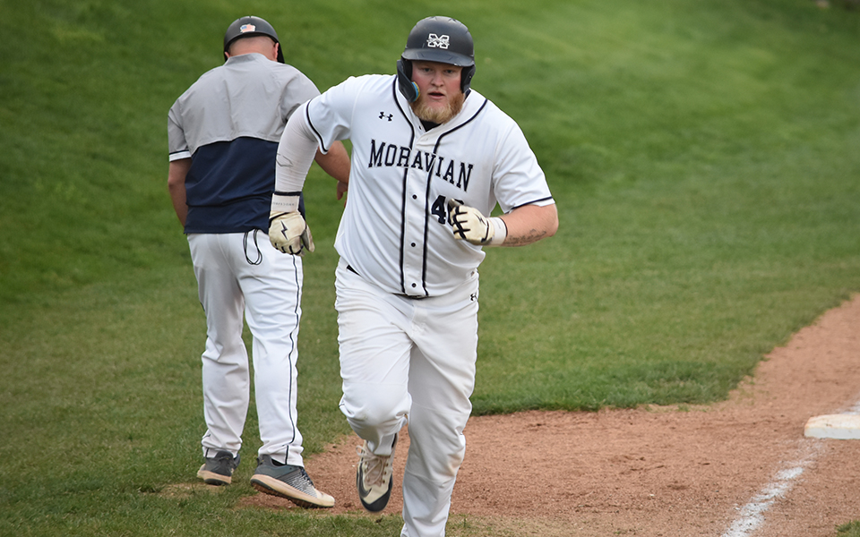 Senior first baseman Cole Cherkas heads to the plate after hitting a go-ahead home run versus Elizabethtown College at Gillespie Field. Photo by Christine Fox