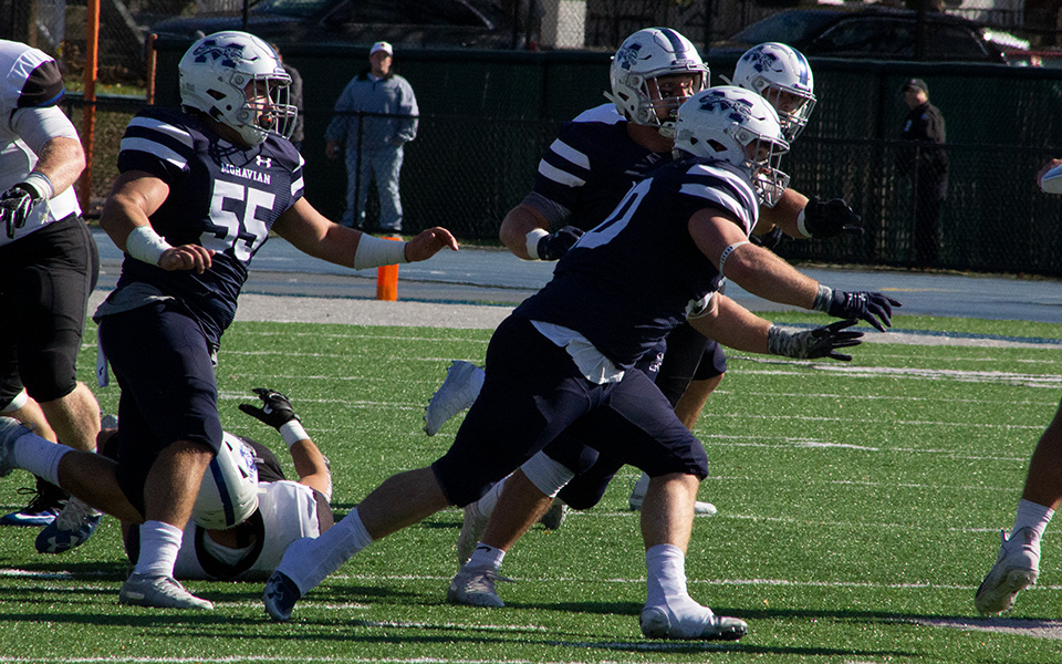 The Greyhounds defense flushes the quarterback out of the pocket during the second quarter versus Franklin & Marshall College at Rocco Calvo Field.