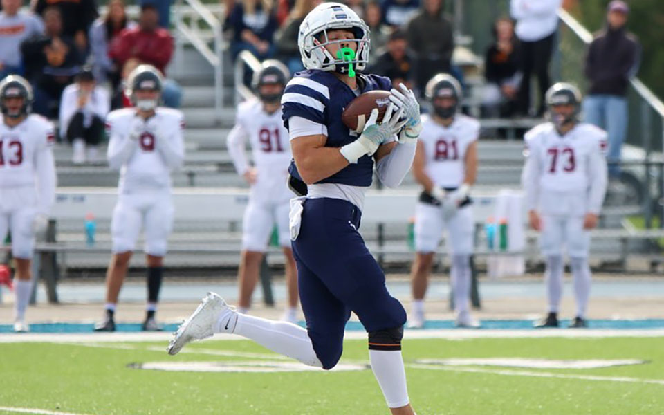 Senior Nick Petros hauls in an 80-yard reception in the first quarter versus Ursinus College at Rocco Calvo Field. Photo by Ashley Hacker '25