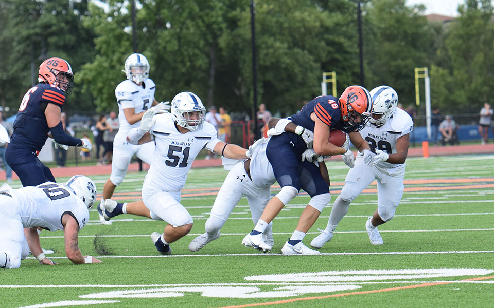 The Greyhounds defense makes a stop in the third quarter during Moravian's 16-13 overtime win at Gettysburg College.