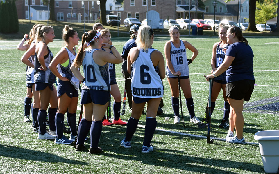 The Moravian field hockey squad huddled up during their first practice of the 2022 season.