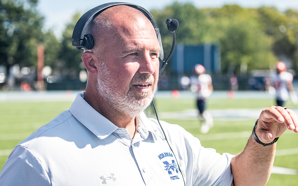 Jeff Pukszyn '98 on the sideline during the Greyhounds' 43-28 victory over Gettysburg College at Rocco Calvo during the 2022 season. Photo by Cosmic Fox Media / Matthew Levine '11